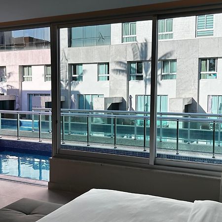 Jade Hotel Brasília Candangolandia Exterior foto A view of the pool from a guest room